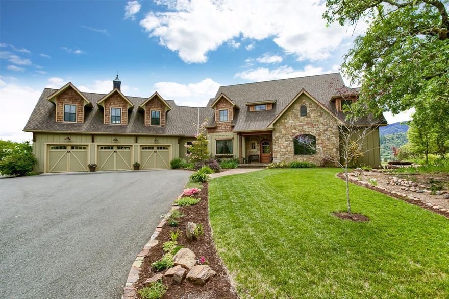 No drive-bys please! First time on the market! Custom home with quality throughout on over 10 acre zoned EFU. The home has a very relaxed but elegant feel and valley views from every room. The living room has a handsome fireplace and direct access to outdoor living space. The gourmet kitchen with Wolf and Sub Zero appliances, large island and gorgeous cabinets is a chief's dream. On those warms evening enjoy the screened in porch or roasting Smore's over the outdoor BBQ pit. Wake up in the main level master suite and enjoy the fantastic views or relax in the beautiful freestanding tub or the outdoor spa. Great separation of other bedrooms and two huge bonus areas, up and down. Three car oversize garage and large two story barn/shop with full RV hook-up. Simply stunning!