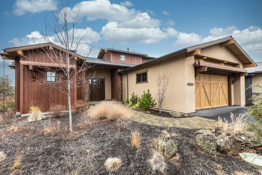 Inviting open floor plan, featuring oversized glass doors with golf views across the large paver patio. Step out your back door to the Nicklaus Signature 16th Hole. Spacious Primary Suite on the main level. The open kitchen features Viking appliances, Pantry and Island eating Bar for entertaining. The Living Area warms to the extra large modern gas Fireplace, TV/Media and floating shelves. Additional features: Private 2nd floor Suite with Tub and 3rd Bedroom, hardwood flooring, Shaker style 8ft Alder interior doors, Slab countertops, generous Mud/Laundry Room. A wonderful full time home or retreat for a weekend getaway. Short term rentals allowed. Enjoy all of the amenities that Pronghorn living has to offer! Club Membership is included!