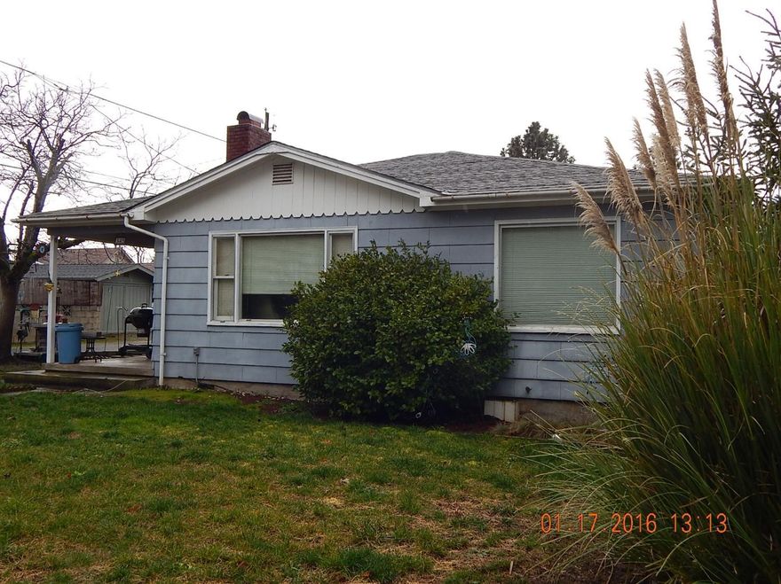 Great buy for an investor or first time home buyer. This 3 bedroom, 1 bath home has 1108 SF, with hardwood flooring in the living room, hallway and bedrooms. New heating system, new plumbing and water heater. Two car detached garage, carport and extra room for an RV. Good size fenced back yard with garden beds.