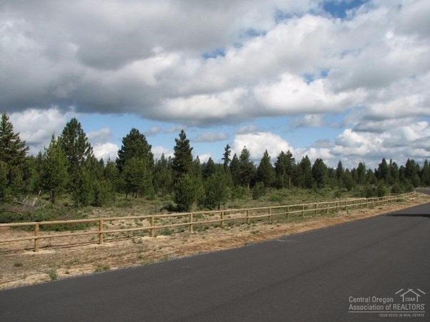 Quiet, 5.26 acre buildable rural parcel near La Pine. All paved access, utilities at the street, septic evaluation completed. Fenced along Mabel Drive with the serene Walker Basin Canal traversing the south side of the property. Horses are permitted, manufactured home are not. Lot 20 is also available to an interested party.