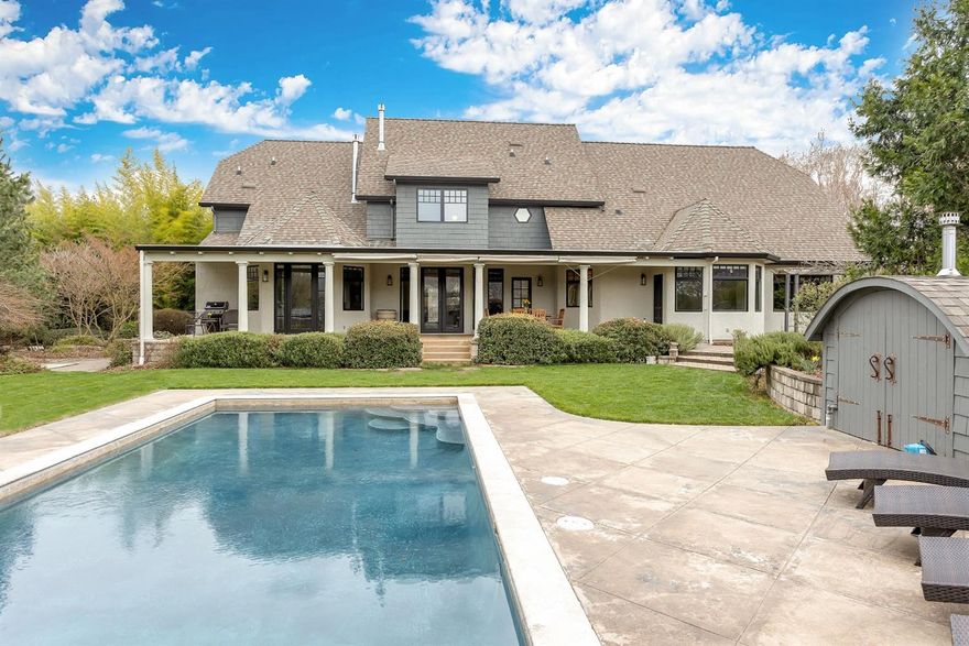 N.W. Contemporary Custom Home close to downtown Ashland; Privacy on 2.04 Acres w/TID Irrigation, Natural Gas, Spectrum Cable, Broadband internet, Solar electricity & Solar Heat for in-ground Salt Water Pool w/natural gas heater. New updates in 2017. Wood, stone/tile floors, Water featured entry, Japanese garden w/2nd water feature, stone/paver walkways w/walking bridge; Beautiful landscaping, fruit trees & garden areas. Fenced pasture; lg RV barn/shop w/unfinished room upstairs. Open kitchen w/dbl ovens, island, Wolf gas range, granite counters, Wet Bar w/wine fridge. Family rm w/French doors lead to office/den w/built-in bookcases. Outdoor covered sitting rm overlooking pool & landscaping w/ natural gas BBQ Grill. Main level master w/gas fireplace & French door to covered patio. Lg Walk-in closet, dbl sinks, soaking tub, dbl head shower plus water closet. Living rm w/built-ins, gas fireplace & French door to covered patio. Upstairs is 2nd suite w/2 bdrms & bath.