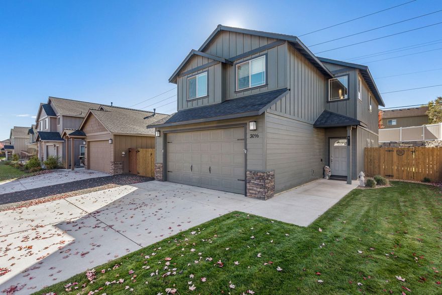 Immaculately maintained home in the Fieldstone Crossing community in NW Redmond! Spacious living both inside & out this Great Room floor plan. Open kitchen features plenty of space w/Driftwood Cabinetry & an abundance of prep space on the slab Quartz counters. Full height tiled back splash, breakfast bar & SS appliances included. The main living space offers a cozy gas burning fireplace, engineered wood flooring, tons of natural light & plenty of room for gathering or entertaining. Spacious Owners Suite w/walk in closet, dual vanities & enclosed water closet. Two additional guest suites share a full bath. Large bonus room upstairs for your own flex space or 4th bedroom. Laundry room + additional half bath located on the main level. Gas forced air w/high efficiency furnace & A/C. Triple, tandem car garage + RV Parking, storage shed out back. Fully landscaped & fenced w/auto sprinklers + pergola.