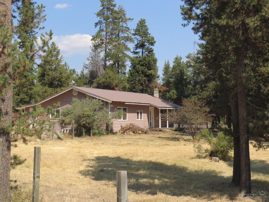 Over an acre in prime Central Oregon recreation area. Perfect for the handy homeowner or investor, this single level home just needs a little work to be a gem! RV spots, storage building & barn, fenced yard & animal enclosure. Pet friendly property w/ mature pines and a private well. Lot next door is also for sale!