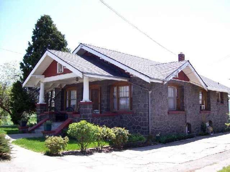 1929 Rock Home With Garden Apartment. Main Level Has Long Term Tenants & Features Inlay Hardwood Floors & Leaded Glass. Basement Apt. Has Own Entrance. Sale Includes Large Adjacent Lot Below Bike Path With Geothermal Well Drilled In 2002. See Addendum...