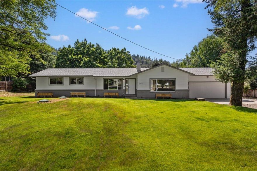 Welcome to your fully remodeled home where everything feels brand new. This 3-bed, 2-bath gem offers both a living and family room for flexible space to relax or entertain. Nearly every inch has been updated: new electrical, new five head minisplit system, dual-pane windows, fresh paint inside and out, new doors, trim, lighting, and plumbing fixtures. The kitchen features new cabinets, counters, and stainless appliances. Laminate flooring runs throughout, with tile in the bathrooms and a custom tile shower in the primary suite. Step from the kitchen onto a new back deck that overlooks the backyard. The front yard features fresh grass and great curb appeal. You'll also love the 1,000 sq ft detached shop with new roof, insulation, 240V outlet, RV hookup, new doors, and lighting. With a new septic system, attic insulation, attached garage, and plenty of parking—this turnkey home has it all!