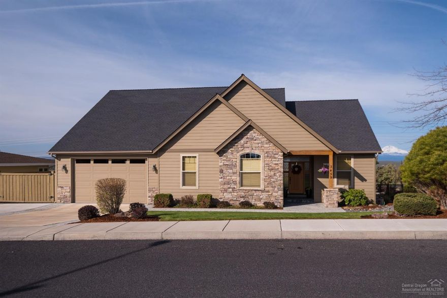 Nicer than new mainfloor master home with RV parking and panoramic cascade mountain views located in Cascade View Estates. This home features a great room design, a gourmet kitchen w/ slab granite counters, an island w/breakfast bar, vaulted and 9' ceilings throughout, hardwood, carpet, and tile flooring, an upstairs second master suite that doubles as a bonus room, a separate den, attached triple garage, amazing back deck with fire-pit, a private hot tub area, & a beautifully landscaped/fenced back yard!