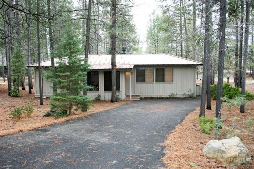 This single level home located close to the Sunriver Village Mall was completely updated in 2005. Updates and features include: hickory cabinets, hardwood & tile floors, carpet, open great room vaulted ceilings with timber beams, newer gas fireplace with mantle. Home has been upgraded throughout. Metal roof, paved driveway. Come see what Sunriver has to offer including the new remodeled Mall, SHARC indoor & outdoor swimming pools, slides, Rip Tide Caf, work out room, tennis, golf and so much more.