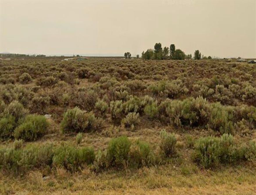 Vacant lot, just under an acre, ready to be yours on Christmas Valley Hwy. Property overlooks a vast landscape with flat fields, rolling hills, and mountains. This parcel is near Christmas Valley golf course and lake! Short distance to Christmas Valley sand dunes. The property is zoned residential with power running along the Hwy. Buyer to perform due diligence. Bring your vision, toys and sense of adventure and get ready to call this property home!