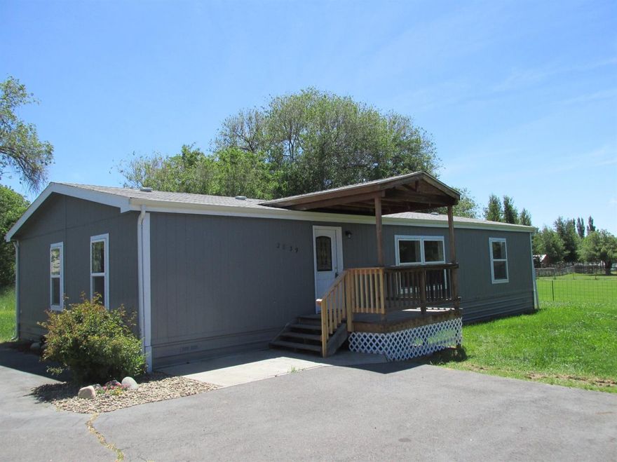 Nice 3 bedroom 2 bath manufactured home in the Suburbs! Home has just been painted inside and out. New floor coverings, light fixtures and stainless steel appliances. It was built in 1995 and has 1568 sq. ft. It has a large kitchen with many cabinets and a lot of counter space. Large living room that is open to the dining area. All 3 bedrooms are good sized with large closets. FA heat and it has a laundry room. It is on .32 acre. 2 storage sheds and a covered front deck. This is a Homepath property.