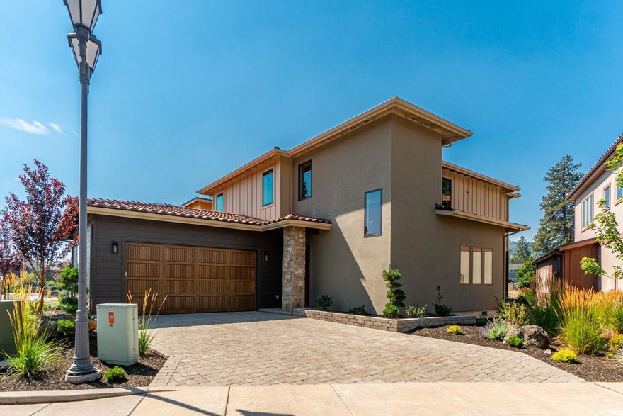 Step into this new home and discover a perfect blend of style and comfort. The combination of modern elegance and subtle yet distinct color schemes creates a unique ambiance. The floor plan allows for a thoughtful separation between communal areas and bedrooms, providing efficient and well-proportioned use of space. The well-appointed main floor primary suite is the sanctuary you desire at the end of a long Central Oregon day. The second story hosts a guest suite, two bedrooms, and a family room ready to become your ideal game space, media room, or personal gym.
The convenient NW location is just ¾ mile from the new Costco, 1 mile from North Star Elementary, and 2 miles from downtown. If going out isn't your jam, enjoy warm summer nights in the freshly landscaped backyard, which offers ample patio space for a BBQ and plenty of room for the fur babies to roam. Take your time appreciating what a new home could add to your life.