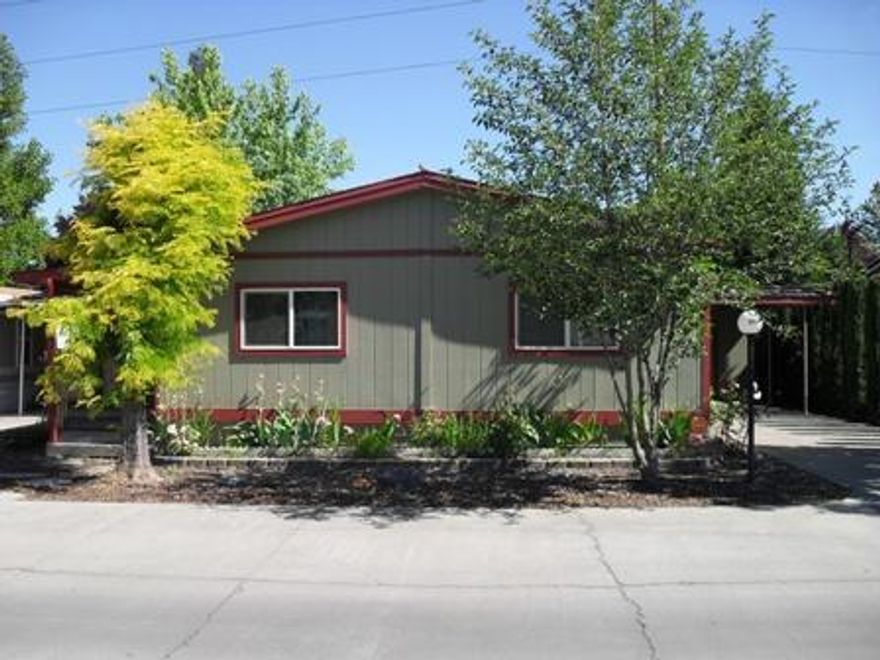 Extremely nice home in exceptional condition! This 3 bedroom 2 bath has so much to offer including a large kitchen with lot's of cabinet space, tile counter tops, and ceramic tile flooring. Well balanced out floor plan makes the home feel spacious and comfortable. Enjoy the large private deck in the back yard. Take a tour today and see all the great amenities that this home and park has to offer.