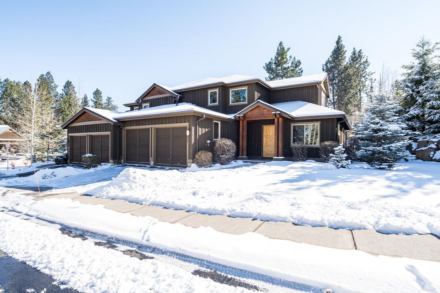 Craftsman style townhome in the gated community of PointsWest, near Deschutes National Forest, Deschutes River, Widgi Creek GC & the road to Mt Bachelor. This great room floor plan has soaring ceilings, office with built ins, rock fireplace, hardwood flooring, custom cabinetry, main level primary suite with walk-in closet. Open kitchen with granite/island. Powder bath & spacious laundry room with extra storage. Upstairs includes a junior suite with tiled tub/shower, Two additional bedrooms and full Jack and Jill bath. Step outside to a lovely backyard with paver patio and green common space. Water feature and southern exposure highlight this area. This townhome offers a highly desirable floor plan for both fulltime living and as a vacation home in Bend. HOA covers all yard maintenance and repair, all exterior maintenance and repair (painting, staining, roof replacement) street maintenance, gate, snow removal from street, and structure insurance.