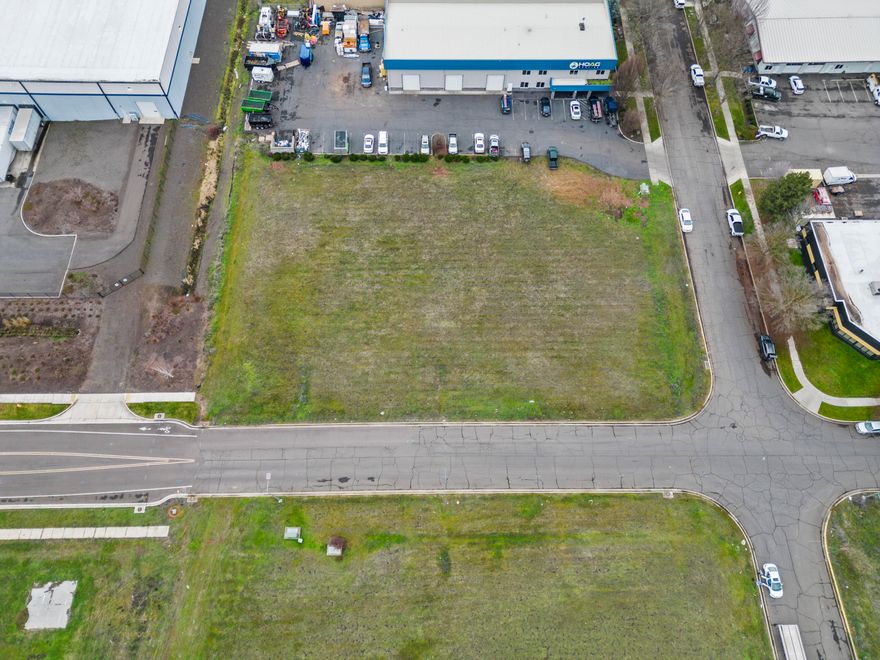 This Opportunity Zone Commercial property is close to the Medford Airport. It is zoned for many potential uses and is in the Vilas Industrial Park. The property is a 1-acre corner parcel with great access, close to the new expressway, airport and centrally located. The utilities are at the property. Opportunity Zones are a tool for economic development. They usually allow investors to defer, reduce, or eliminate taxes on their unrealized capital gains. Current information indicates that this parcel is in the opportunity zone. Close to the new Pepsi, Amazon and City of Medford Center.