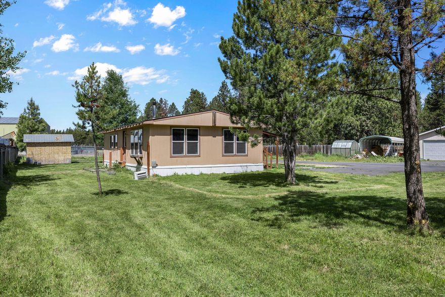 Great investment opportunity in Bend! Located on just over a half acre,
this 2 bed, 2 bath, 960 SF home has been nicely updated inside and has
new carpet, new SS dishwasher, cherrywood cabinetry, tons of storage
space and lots of natural light! Plenty of room to build a shop or
detached garage. Home needs a plumbing repair (Contact agent for
details) and will be sold as-is. Great opportunity to buy a very livable,
cute home in Bend at an unbeatable price! Great location with private
community river access, close to hiking and biking trails, Sunriver, the
Deschutes river and Mt Bachelor!