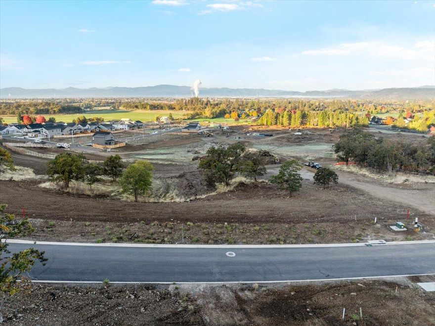 Introducing Quail Run Estates, Eagle Point's premier new subdivision of large luxury estate lots. Discover a rare opportunity to build your dream estate on one of these generous 1-acre view lots, perfectly situated overlooking the renowned Eagle Point Golf Community. These elevated home sites boast breathtaking, panoramic views of the golf course, surrounding mountains, and Rogue Valley. LOT 74
