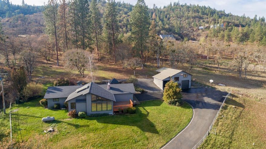 Wonderful 1.5 acre setting and home beautifully updated in 2015! Vaulted great room with wall of windows to showcase pastoral and mountain views - including the Table Rocks. Brick fireplace with raised hearth. Eating bar between kitchen and great room. Kitchen has new granite counters, tile backsplashes, new gas range/oven, new dishwasher, island, new cabinetry, and new lighting. Brand new bamboo, carpet, and tile flooring. Vaulted master bedroom with 2 closets. Master bath features new shower, double sink granite vanity, lighting, mirrors and commode. Additional bathrooms also have brand new: granite vanities, commodes, lighting, and tile shower surround in larger guest bath. Fresh paint inside and out. Newer efficient duel fuel heat pump. Indoor laundry room with extra cabinet storage. Picnic area under gazebo with new roof. New water shed. Attached 2 car garage. Detached RV garage/shop with 2 carports. Stable. Perfect ranchette complete with irrigation!