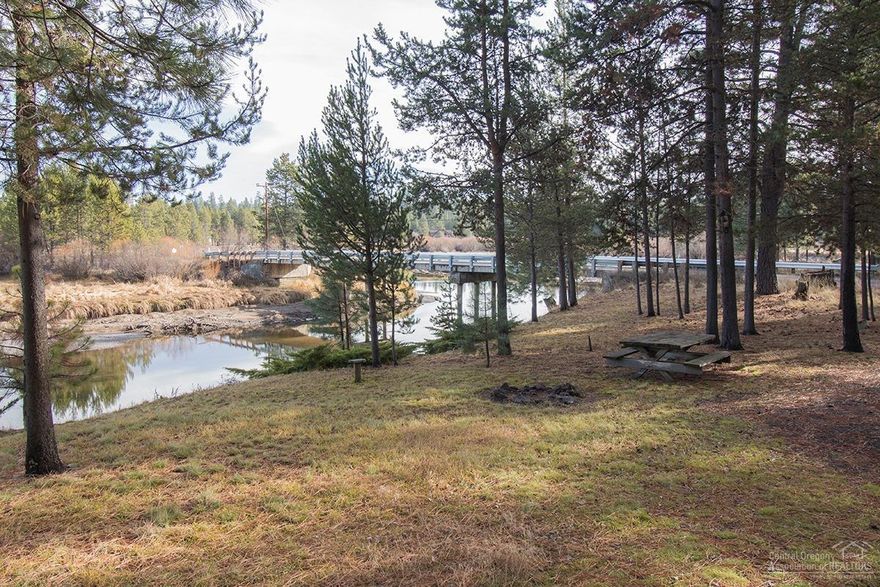 Hard to beat how close this single level home is to the Big Deschutes River so don't delay if you are looking for a home right on the water.Features include wonderful Ponderosa Pine trees, detached over sized garaged, shed, large lot - .67 acres. Property previously had a 8 x 8 dock and the Fish and Wildlife department told the seller it was grandfathered in, but this would the buyer's responsibility to confirm.