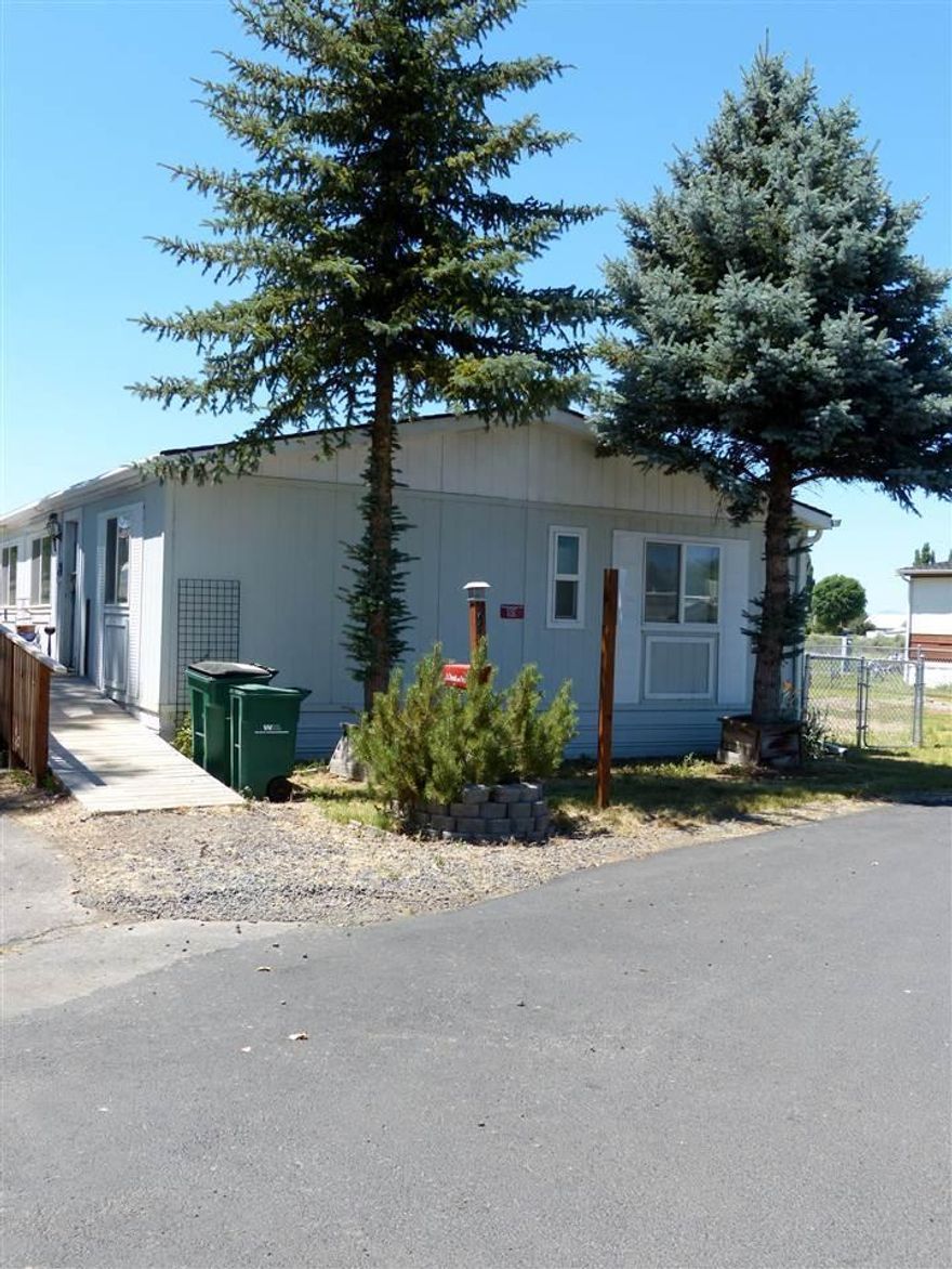 Great Location In The Park At The End Of The Street With Only One Neighbor. Beautiful Kitchen With Lots Of Storage. All Appliances Stay Including Washer & Dryer! Home Has Split Living And A Walk In Closet In The Master. Great Little Deck Out Back And A Fenced Yard. Carports And Sheds Stay. Home Is Wheelchair Accessible With A Ramp And Extra Large Doorway Into Master Bedroom.