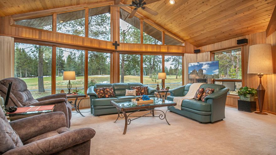 Don't miss this opportunity to own this custom-built home with unobstructed views of the 13th Fairway of the Woodlands Golf Course from nearly every room. Single level living except for one step down into the great room. 3 bdrms + den & add'l sitting/sleeping area off the kitchen. Updated kitchen includes granite counters plus SS appliances. Extra spacious primary suite that is large enough for a workout area, desk or hobby area. Both full baths are updated w/ granite counters, tile floors & full tile showers. Enjoy a soak in the oversized tub in the primary master.  Vaulted cedar ceilings w/ cedar accented walls throughout the home give it the warm Sunriver Feel. Impressive floor to ceiling Oregon moss fireplace w/ a free-standing wood stove.  Wrap around Trex deck to enjoy the amazing outdoor space. Oversized 2 car garage + storage. Roof replaced 2018. Used by its present owners and the original owners as a primary home/second home.  Never been rented.  SHARC paid!