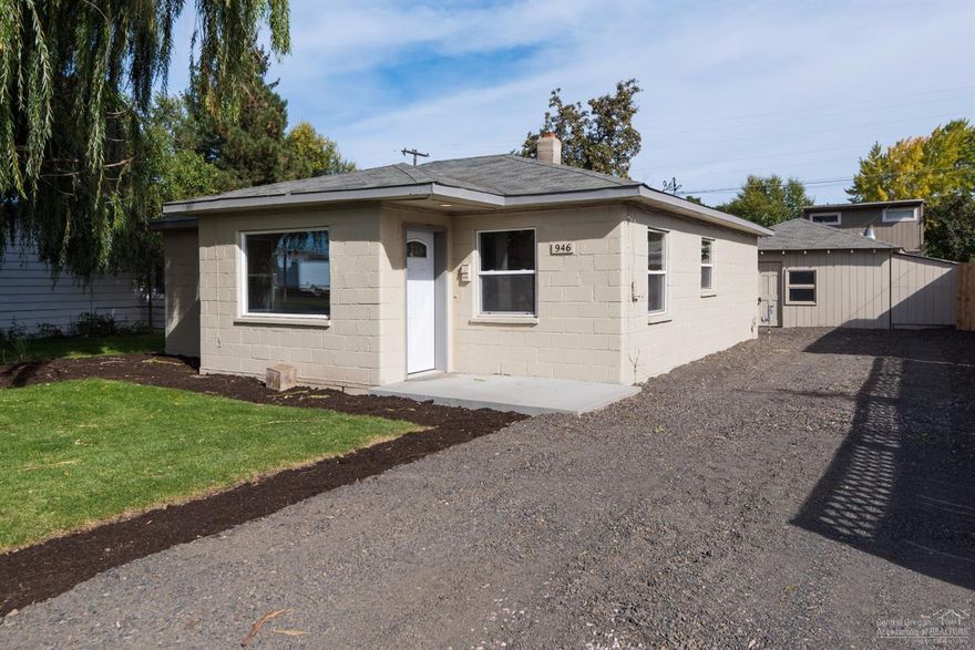 Nicely remodeled midcentury cottage with alley access and RV parking. This home features restored original hardwood floors, a remodeled kitchen with all new stainless appliances, new cabinets, a brand-new sink and slab granite countertops. It has been repainted inside and out and has a new bathroom & an extremely spacious utility room with lots of built-ins. The detached garage is oversized and heated and has a lean to attached for storage and the back yard has a big deck & a very productive pear tree!