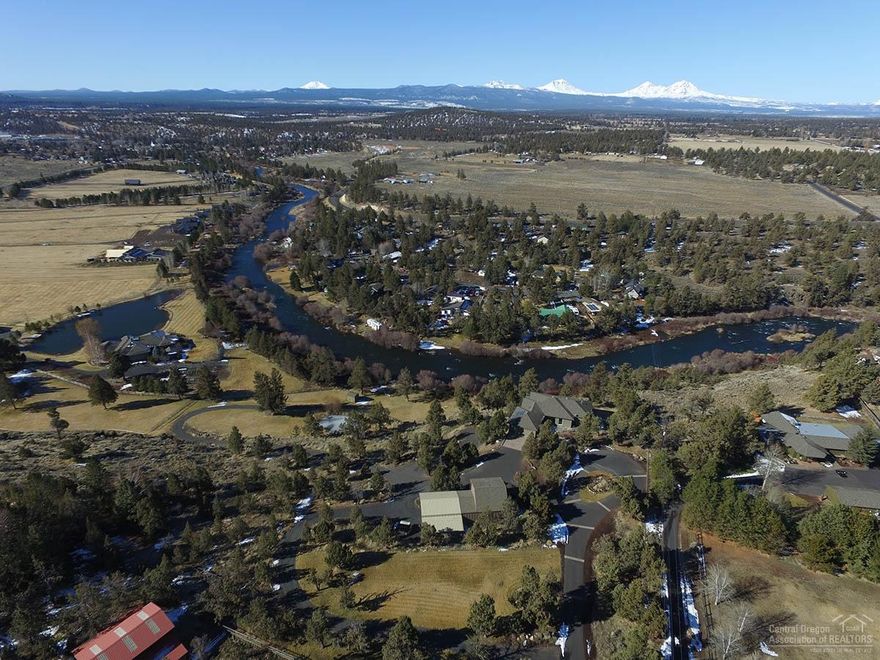 425 feet of river frontage AND full Cascade mountain views. Guest quarters (detached) and covered RV parking.