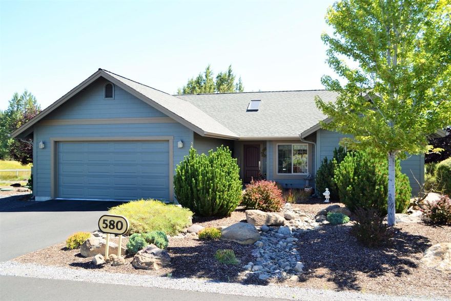Enjoy all the amazing amenities of Eagle Crest! Like new, single level home with exterior recently painted. High ceilings, slate floor entry, beautiful wood floors, slate fireplace, spacious kitchen with large island, den/office with a view of the 8th fairway. Master bathroom with separate soaking tub and shower. Large paver patio with Smith Rock views and plumbed for BBQ. Easy access to walking path. Enjoy the Resort amenities of golfing, pools, recreation facilities, restaurant & more. 55 and older.