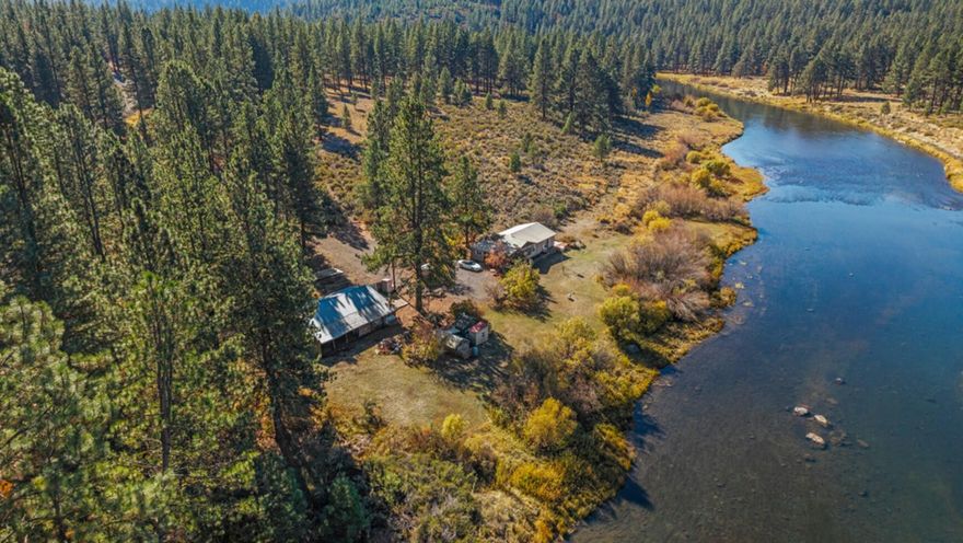 Along the Sprague River & bordered by National Forest, this unique property offers a 2 BR, 2 BA home, about 700 ft of river frontage, a 24x46 garage/workshop, RV parking, small storage sheds & even a seasonal creek.  Enjoy 14 unique kayak runs within 10 miles, direct ATV & snowmobile access, abundant wildlife and exception fishing and hunting opportunities.  Again, you would have direct access, especially now that Chinook salmon have returned to spawn.  Hickory kitchen cabinets, large river-view windows, oil stove backed up with a certified woodstove make this a cozy home.  The garage/workshop has power, concrete floors w/ space for your car, bikes & gear. A rare parcel that would be ideal as a primary residence, vacation getaway or income property.  Just 5 miles from Chiloquin, between Crater Lake National Park & Klamath Falls, you'll love the privacy and potential this riverside retreat offers.  Make your appointment today!