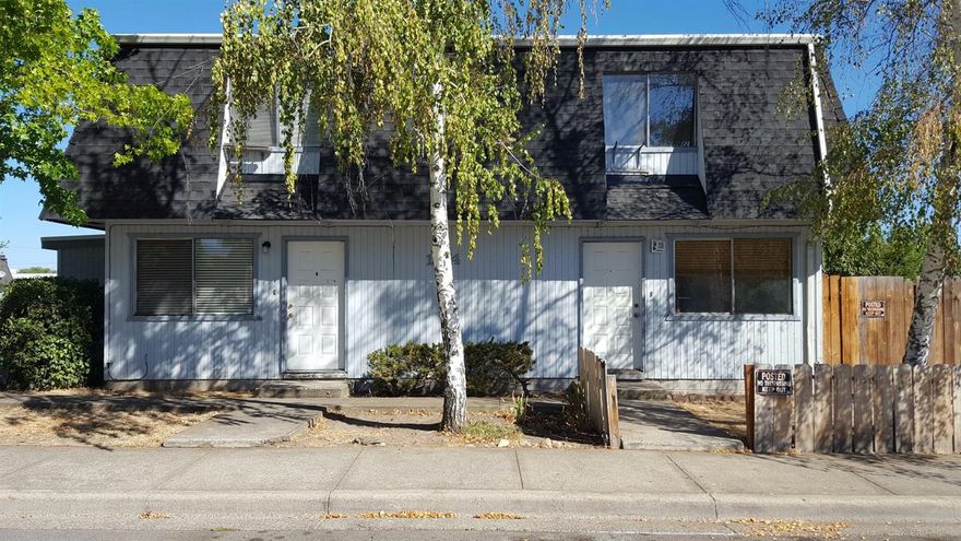 Live in one, rent out the other. Two-story townhouse style duplex, each unit has two bedrooms and one bath upstairs and would make a great investment opportunity. Units mirror each other. Each unit has their own fenced private backyard with patio and washer and dryer hookups. Unit A has newer floor covering in kitchen, dining room, bathroom and entry. Carpet in the living room was new in 2015, as was interior paint. Carpet has been freshly cleaned. Appliances included unit B appliances included, newer heat pump new roof in 2013 sold as is, price reflects updates needed.