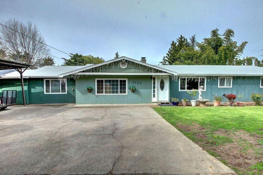 4 bed 2 bath 1,608 sq foot home on a half acre lot. Featuring a large additional room perfect as a hobby area or additional storage space. This home as been well kept and updated throughout the years and is ready for you to call it Home! The backyard has it all! Large decks perfect for family gatherings, a pond with waterfall, garden areas and mature trees. Call today for your personal tour!