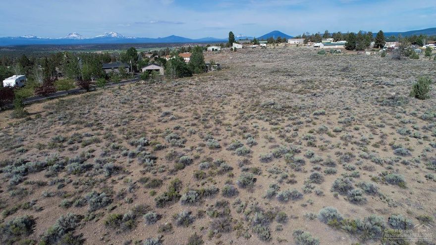 Come and build your dream home on this huge 5+ acre lot with fantastic Cascade Mountain Views! There is so much room on this property for all the outbuildings you could ever want. Bring your horses and toys! Power is at the corner of the lot. Property has been approved for septic and sits on the community water system. Bring your builder and snatch up this piece of paradise!