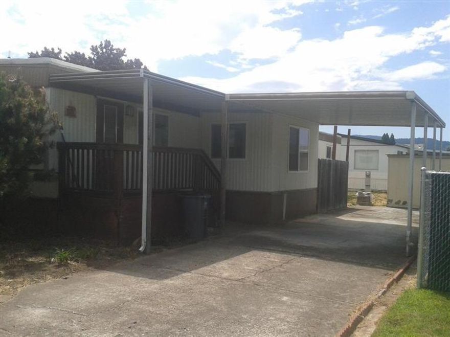 You can own your Own!!! This 900 plus sq. ft. home located in Greenbriar Terrace which is a 55+ Community, was updated by Access approximately 8-9 years ago, with a New Roof, New Windows, and an Upgraded Heat Pump. This is a 2 Bedroom, 1 Bath with an additional tip-out area making a for a larger living space in the Family room. It has been plumbed for a Dishwasher and Ice maker as well. Just out side in the front of the home is a nice yard area for a garden or new landscaping, as well as a large deck for relaxing and entertaining. The Park also offers an indoor swimming pool, a clubhouse and has many opportunities to participate in several community activities.