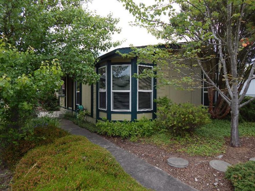 Well maintained, single owner home in an all age park. There are 3 bedrooms (one of which is currently used as an office and does not have a closet), and 2 full baths. New heat pump in 2014. Large, light filled living and dining rooms with vaulted ceilings, spacious kitchen with skylight and walk-in pantry and a master bedroom with double closets. Master bath includes large soaking tub, separate shower and double sinks. Conveniently located close to the YMCA, shopping and public transportation.