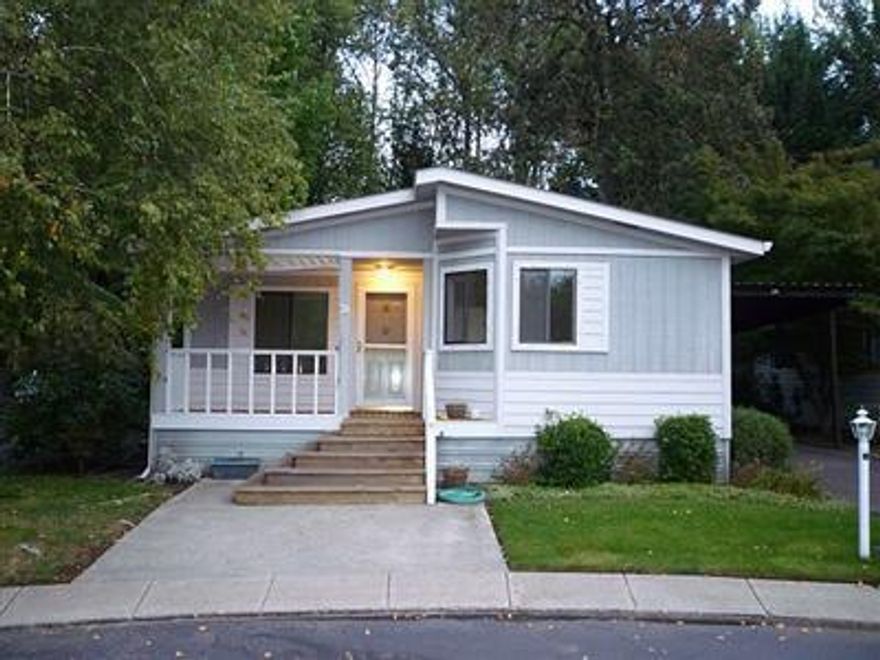 Wonderful home in a special location. Covered front porch, vaulted ceilings. Light and bright 2 master suites. There is an additional approx 220 Sq.Ft. Sunroom/Cabana per county assessor, overlooking an enchanting garden. Lots of privacy, mature landscaping, carport and storage for gardening. Appliances included. Over 55 Park in historical Jacksonville.