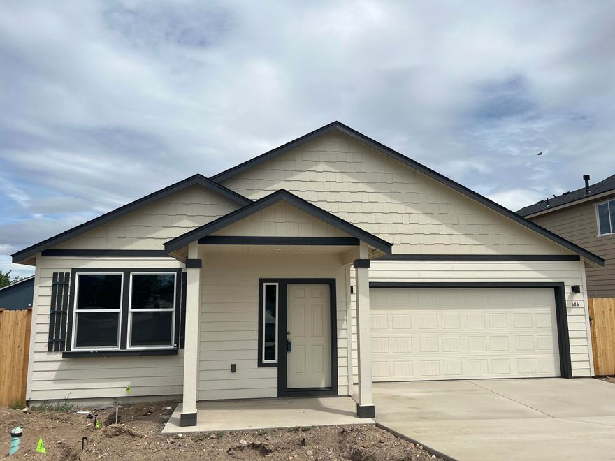 Welcome home to this adorable, brand new home in beautiful Madras. This single level home includes laminate flooring in the main living areas, stainless steel appliances and a generous kitchen island. Outside you will find a landscaped front yard with sprinklers and a covered front porch. This home is priced to sell quickly so, contact your agent and set up a tour today! Estimated completion date is 06/15/22.