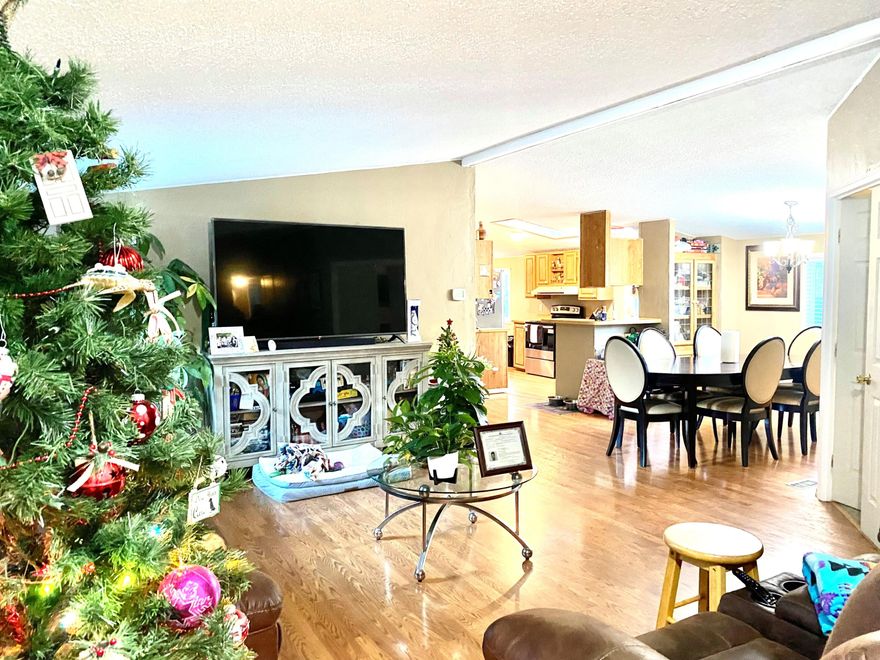 Large 4 bedroom, 2 bath with skylights and plenty of separation from primary with private suite. Vaulted ceilings and rebuilt heat pump for the hot evenings. New exterior paint, Back yard fully fenced with deck and new patio pavers leading to your large shop for all your tools. Front covered deck overlooking landscaped yard with timed sprinklers. $925 monthly space rent includes water and sewer plus maintenance of the park and grounds. All occupants need park approval with credit and background check.  Must show 3 times monthly income of space rent to qualify. Call park manager Genie for approval process. NO SUBLEASE. OWNER OCCUPY ONLY, NO LAND,  Home sold as is.