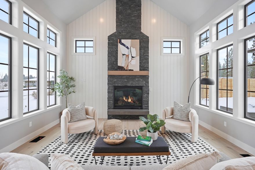 Unwind in the serene ambiance of this modern farm house by Luxe Homes. Nestled on a single level, this paradise boasts an open-concept layout, maximizing the use of space and natural light. The large kitchen, is paired with a walk-in pantry and large central island, seamlessly merging function and design. The house offers a designated office space near the entrance and an optional fourth bedroom, offering the flexibility to cater to your lifestyle needs. Revel in the privacy of the primary suite, thoughtfully separated at the back of the house. The suite invites relaxation with its dual vanities, elegantly designed soaking tub, and walk-in tile shower. Not to be overlooked, the generous garage includes a spacious third RV bay. Combining sophisticated aesthetics with modern functionality, this home promises a luxurious living experience.