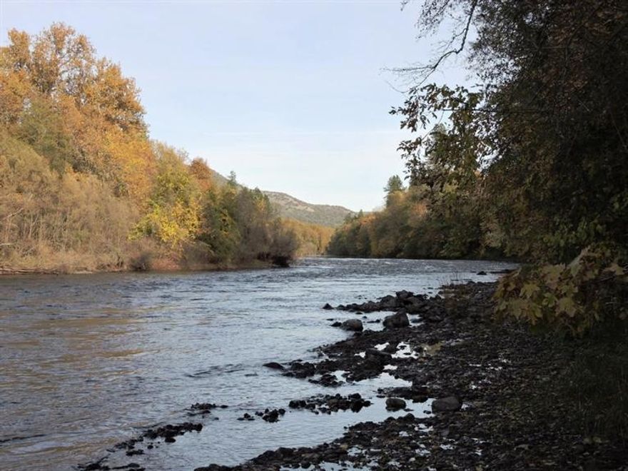 Highly desirable waterfront home on 200 feet of the world renowned Rogue River. The house is situated on the river with gorgeous views of the river featuring multiple decks for entertaining and stairs to your own private fishing hole that holds Salmon and Steelhead. A fisherman's dream! The home has an open floor plan and is 2033 Sqr.ft on the main level with Master suite and 2 additional bedrooms, 3 bath and office. A HUGE bonus is a 1980 Sqr.ft finished daylight basement with private entrance and 4 large bonus rooms - pool table room, card room, exercise room and sewing room and closet and tons of storage. The possibilities are many! The exterior is fully landscaped with drip system. The main level has an oversized 2 car garage and the lower level has an oversized single garage for your boat or additional parking. There is RV parking with water, electric, phone and sewer hookups. Don't delay! This property is well priced and will not last on the market very long.