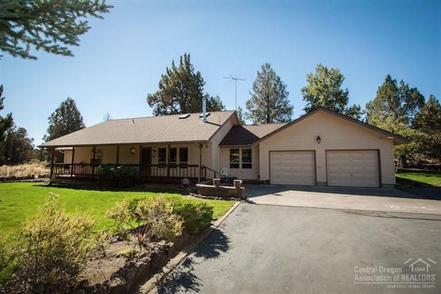 This meticulously maintained property gives you lots of elbow room. the single level home is on a private cul-de-sac on over 2.5 acres which backs up to BLM. The grounds are a tranquil oasis and the home has vaulted ceiling with skylights so is light and bright, a newer wood stove and A/C, a place for your hot tub, an attached 2-car garage and a detached RV garage + heated shop + heated work-out/hobby room with plenty of storage above it. Come enjoy the Central Oregon lifestyle!