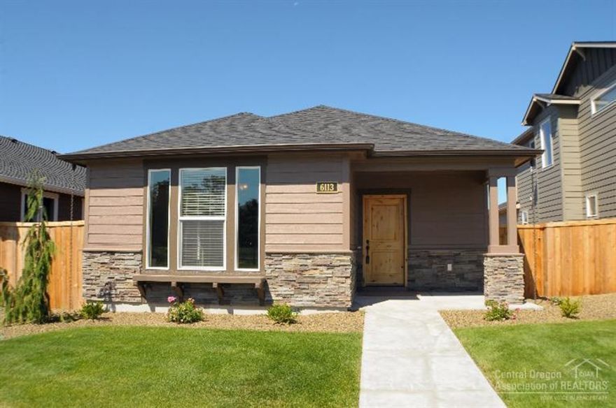This single level home close to Sawyer, Tumalo State and community park in NW Bend has an open concept living/dining/kitchen with wonderful natural lighting. Granite countertops in kitchen, engineered hardwood in kitchen & dining, Stainless GE appliances & oversized garage for extra storage. Pictures of similar home. $3,800 upgrade credit till 9/7/15.
