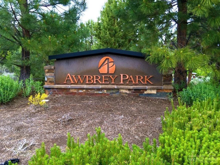 One of the first sites selected in desirable Awbrey Park now available! Build your dream home on this beautiful, spacious lot located in a neighborhood of gorgeous, custom homes, less than one block from Sawyer Park and the Deschutes River Trail system, and near the River's Edge Golf Course. Nearly a quarter of an acre, with all utilities located at the street.