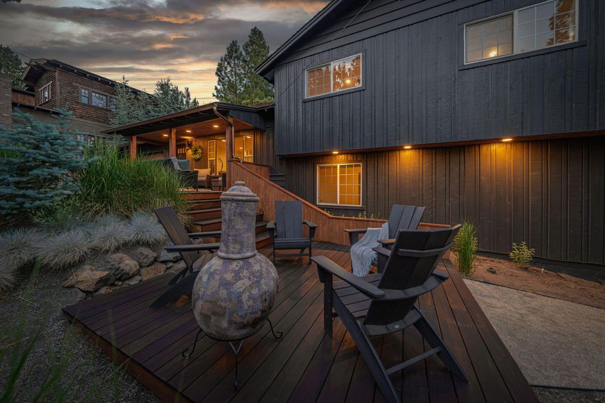 Big Views, Big Vibes, and Big Chickens? Maybe. That's up to you and what you want your Bend life to be! Whether it's convenience, adventure, or opportunity you're after, this 3-bed, 2-bath split-level with a bonus room and .22-acre lot opens the door to all the possibilities. Plus, mountain views from the primary, just to confirm you nailed it. With style for days, this 1968 classic gives you room to stretch out and settle in. Wrapped in fresh cedar siding with matte black accents, the curb appeal slays. The cozy covered porch is perfect for watching summer storms roll in or telling stories around the firepit. Seriously, all the best kind of options! Out back, the oversized deck perches above a fully fenced yard with room to garden, gather, or finally start that chicken coop (naming them is half the fun). Want easy? Schools, trails, groceries, coffee, and restaurants are just minutes away. So, what comes first? The chicken, the egg, or your dream home? (Hint: it's the home!)