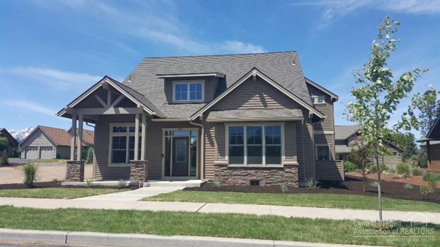 High quality construction, beautiful 2-story great room, open dining and stone fireplace, slab granite and mosaic tile surfaces, custom cabinets throughout, stainless steel Kitchen Aid appliances, den with double door entry and luxurious master suite. Cedar siding and all wood windows. Community Features: Paved walking trails, Cascade Mountain views, swim center with spa and recreation room, and tennis courts. Water features meander through entire subdivision. Easy walking distance to downtown Sisters.