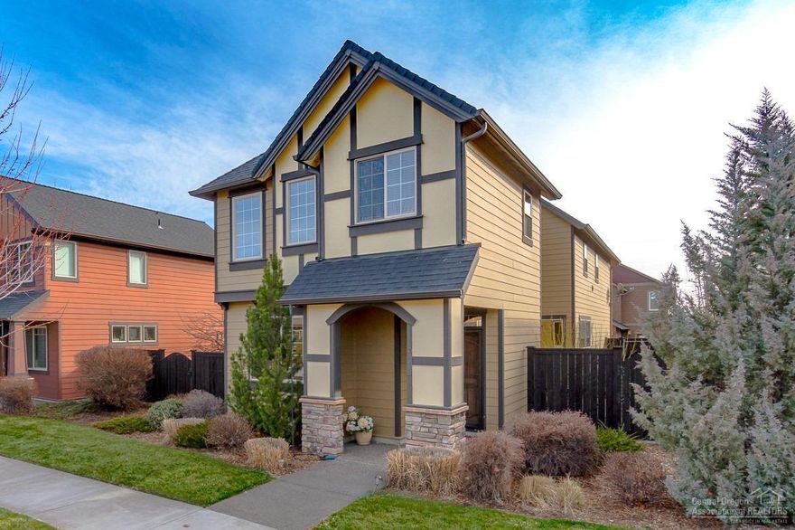 Tour of Homes award winner! Perfect combo of a traditional home in a modern community. All the amenities of a Pahlisch neighborhood situated in NE Bend, quick jaunt to schools &amp; parks. 2 story plan w/comfortable layout. Spacious living area w/gas burning fireplace, open kitchen w/tons of counter space, Travertine back splash &amp; granite topped island.&nbsp;SS appliances &amp; gas range. Take your dinner party outside onto the patio &amp; side yard for year round entertaining.&nbsp; Formal dining room w/cultured stone arched entrance. Upstairs offers a central Bonus area w/adjoining office area, built in book &amp; display cases, laundry room. Oversized Master Ste above the double garage is complete w/ceiling fan, walk in shower, dbl vanities &amp; walk in closet. 2 additional bedrooms upstairs w/westerly views. Alley access, fully fenced, sprinklers &amp; pool &amp; club house too! Newly refinished hand scraped floors, paint &amp; professionally cleaned - truly move in ready. Don