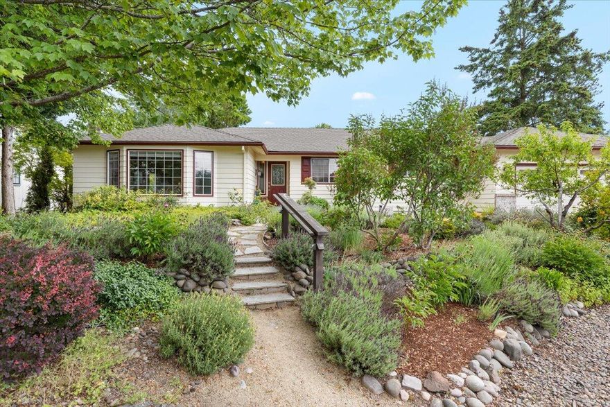 Amazing home- amazing price and terms! Reduced now to 368k,  Owner will carry at 5% for 2 years with 70,000 down. All ages welcome, in the beautiful Sun Oaks community. Two pools and two clubrooms included with your HOA . Right next door to St. Mary school is very close to shopping and medical facilities. Located at the end of a cul-de-sac in gated Sun Oaks Estates, 2406 Senate Way offers 3 bedrooms, 2 full baths, and 1,765 sqft of comfortable living. The living room features a bay window, cove ceilings, a gas fireplace and formal dining. Hardwood floors flow through the entry, kitchen, eating area, and hall. The kitchen boasts granite counters, a skylight, and breakfast bar, opening to a screened sunroom, great for lounging or gardening. The primary suite offers a large walk-in closet and ensuite bath. One guest room, with double doors and a built-in daybed, easily doubles as a home office. The extra-deep garage features a golf cart bay or workshop space with a rear roll-up door