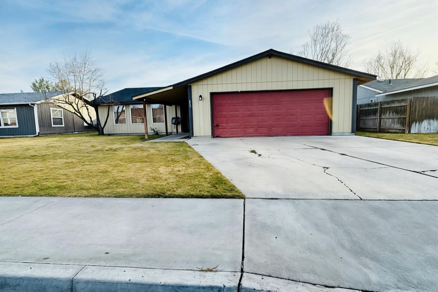Built in 2001, this well-maintained 1,704 sq ft home offers 3 bedrooms, 2 bathrooms, and a 2-car garage on a .15-acre lot. Covered patios at both the front and back of the home provide inviting spaces for relaxing or entertaining. The front yard features a mature peach trees, while the backyard includes pear and cherry trees, creating a charming outdoor retreat. With a functional layout, comfortable living spaces, and appealing outdoor features, this home is ideal for first-time buyers, down-sizers, or those seeking a low-maintenance property.