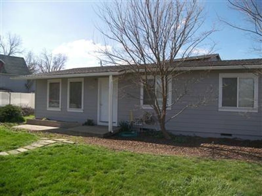 Wow! What a great Buy! Perfect for the investor, 2 family set-up, or buy to move in one and rent out the other! An FHA buyer with 3.5% down could own this for less $400 a month when you count the rent from the back unit. If you moved into the back unit the rent from the front house would just about pay the whole payment on the mortgage!!! What you're buying is a ranch style, well maintained 3 bedroom/1 bath home with a fenced front and back yard which has a newer kitchen, newer roof and forced air heat. The 2 car finished garage built in 2005 has a 1 bdrm/1 bath fully contained apartment above with full kitchen, bath and stackable washer/dryer. was with all modern amenities throughout, nice kitchen with central air and heat. The finished garage provides extra storage and parking space for each tenant to use and enjoy. This is an awesome deal so what are you waiting for!!!