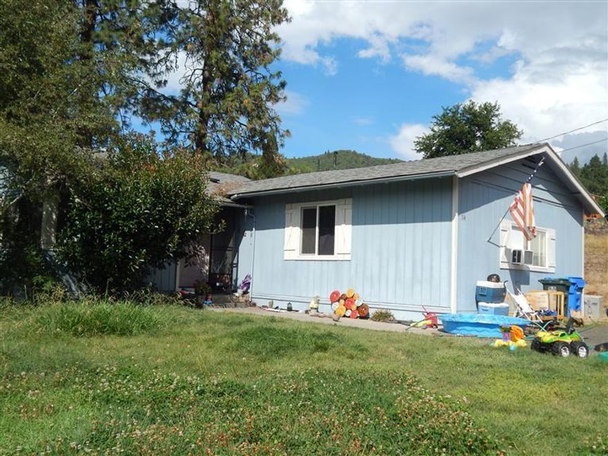 This is a short sale and being sold as is. 3 bdrm 1 bath 1356 sqft home on .41 irrigated acre lot. Large outbuilding. Gas wall heater, window a/c. ceiling fan. Must be cash offer house will not finance.