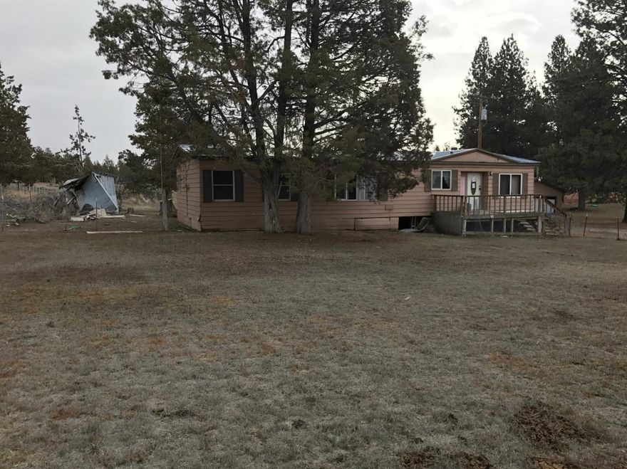 Home in the country. Lots of square footage for the price. This is a 4 bedroom 2 bath home on 2.5 acres. Selling in as is condition. Do your own due diligence.