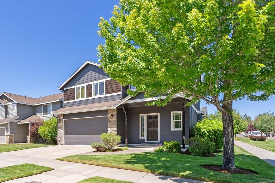 Step into comfort and style in this updated 3-bedroom, 2.5-bath home on a spacious corner lot in SE Bend. With 2,245 sqft of thoughtfully designed living space, this home features LVP flooring, built in speakers throughout, a remodeled kitchen with quartz countertops and stainless KitchenAid appliances, and a cozy fireplace with a stone surround. Upstairs includes a versatile loft area, an updated laundry room and a spacious primary suite with a large walk-in closet. The fully landscaped backyard offers a stamped concrete patio, gas firepit, raised garden beds, and patio cover. New exterior paint, A/C, and garage built in garage cabinets complete the package.