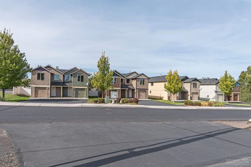 CoHo Crossing Townhomes! Model Home - 2245 SW 22nd St. Townhomes feature great rooms w/stacked stone fireplace & sliding doors to vinyl fenced backyard & patio. Quartz countertops w/stone & glass backsplash, new stainless steel appliances, breakfast bar in kitchens. 1/2 bath, laminate flooring, storage space are additional main level features. Upper level master bedrooms/baths separated from other bedrooms. Upstairs utility. Single car garage. Great location. No HOA'S